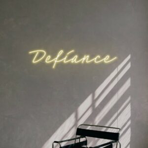 Defiance Letter Led Yellow Neon Light On White Wall