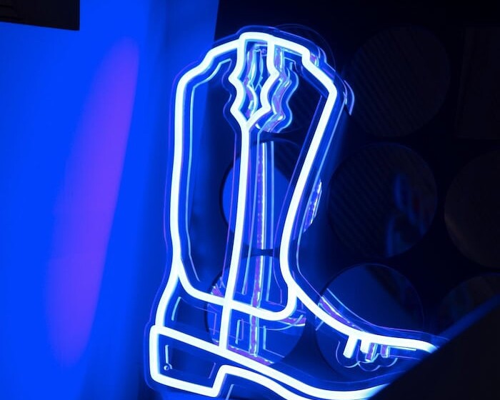 cowboy boot blue neon sign