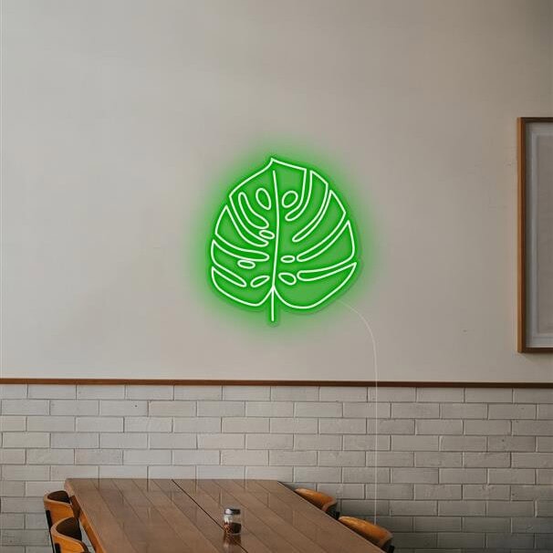 Monstera neon light restaurant decor