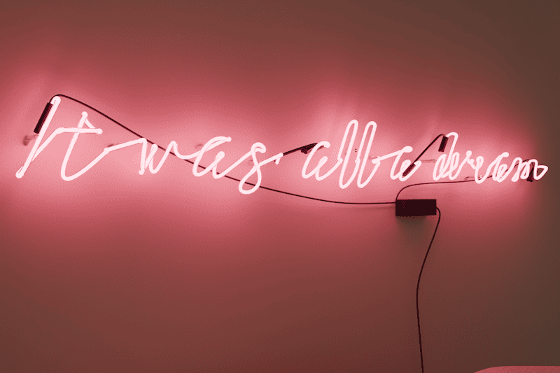 it was all a dream glass neon sign pink neon