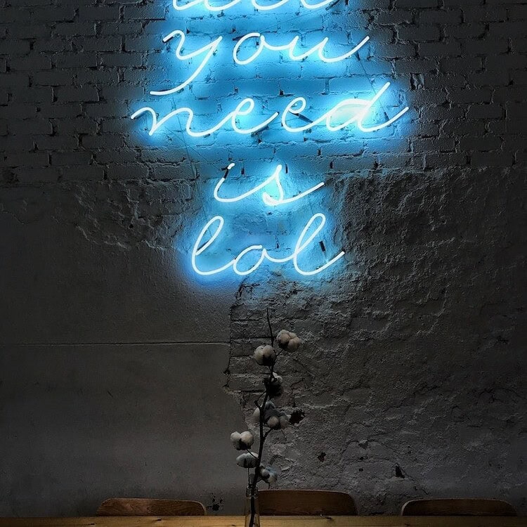 all-you-need-is-lol-white-glass-custom-neon-sign