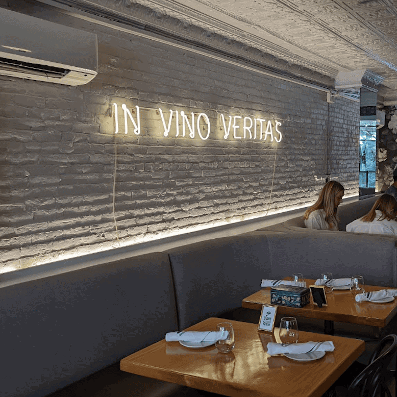 Frenchie Wine Bistro restaurant neon sign in Boston