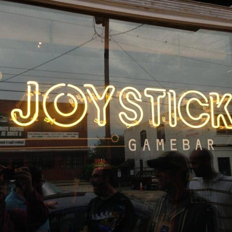 Joystick glass window business neon sign