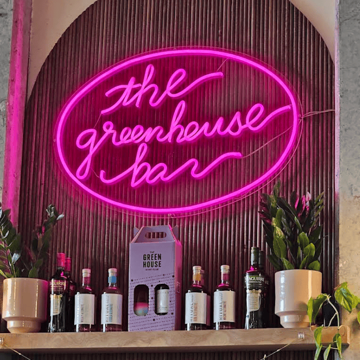 The Greenhouse Bar neon signs in Jacksonville