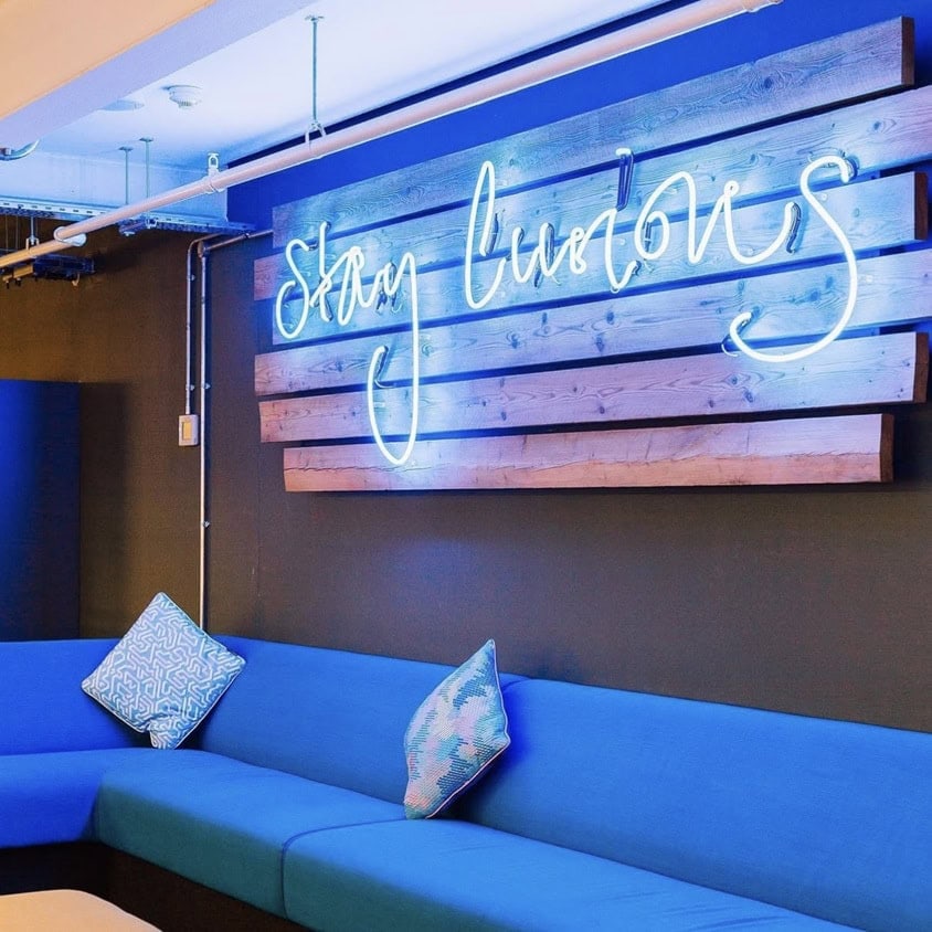 custom glass neon sign for business lounge