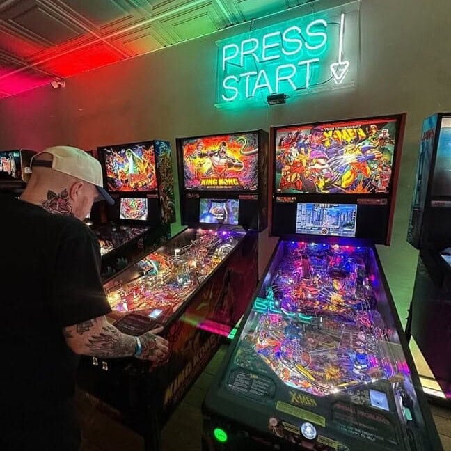 custom glass neon sign with backing easy to hang in arcade