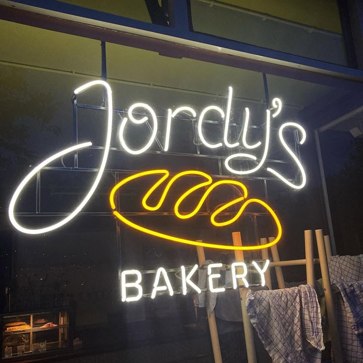 custom-vintage-glass-neon-sign-for-bakery-store-with-metal-bracket