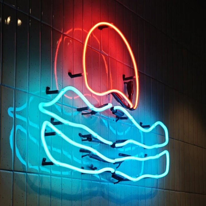 graphic vintage glass neon sign for business