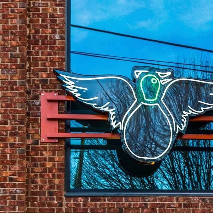 painted duck Atlanta outdoor logo glass neon sign