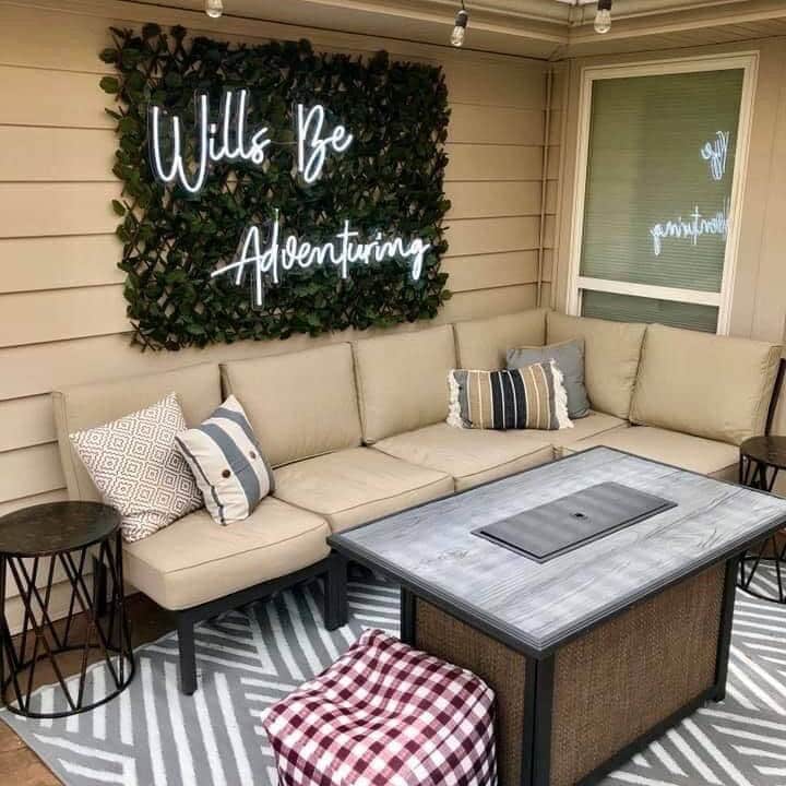 patio neon sign on faux green wall