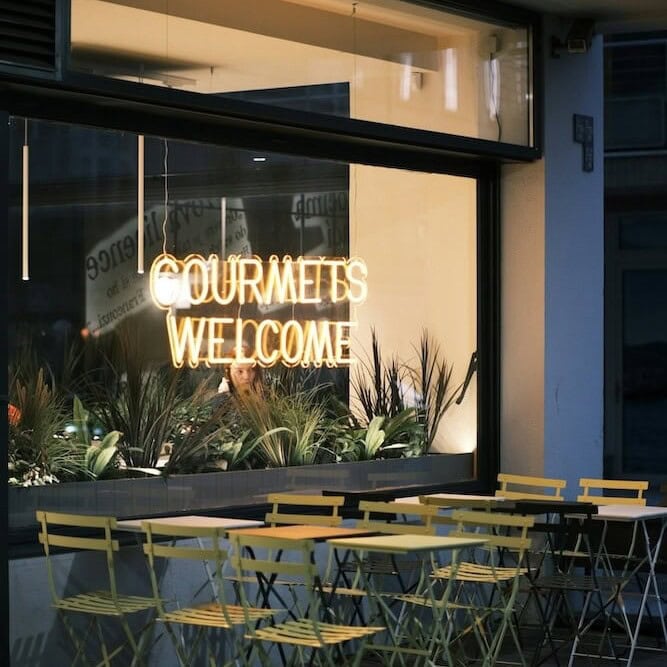 welcome restaurant dining neon sign