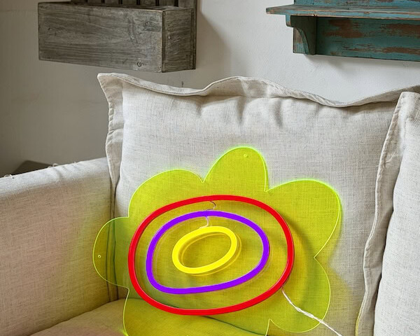 flower neon sign with yellow acrylic board