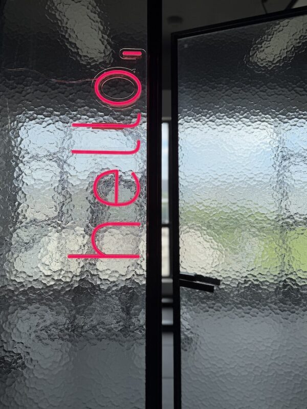 hello. by the door neon light